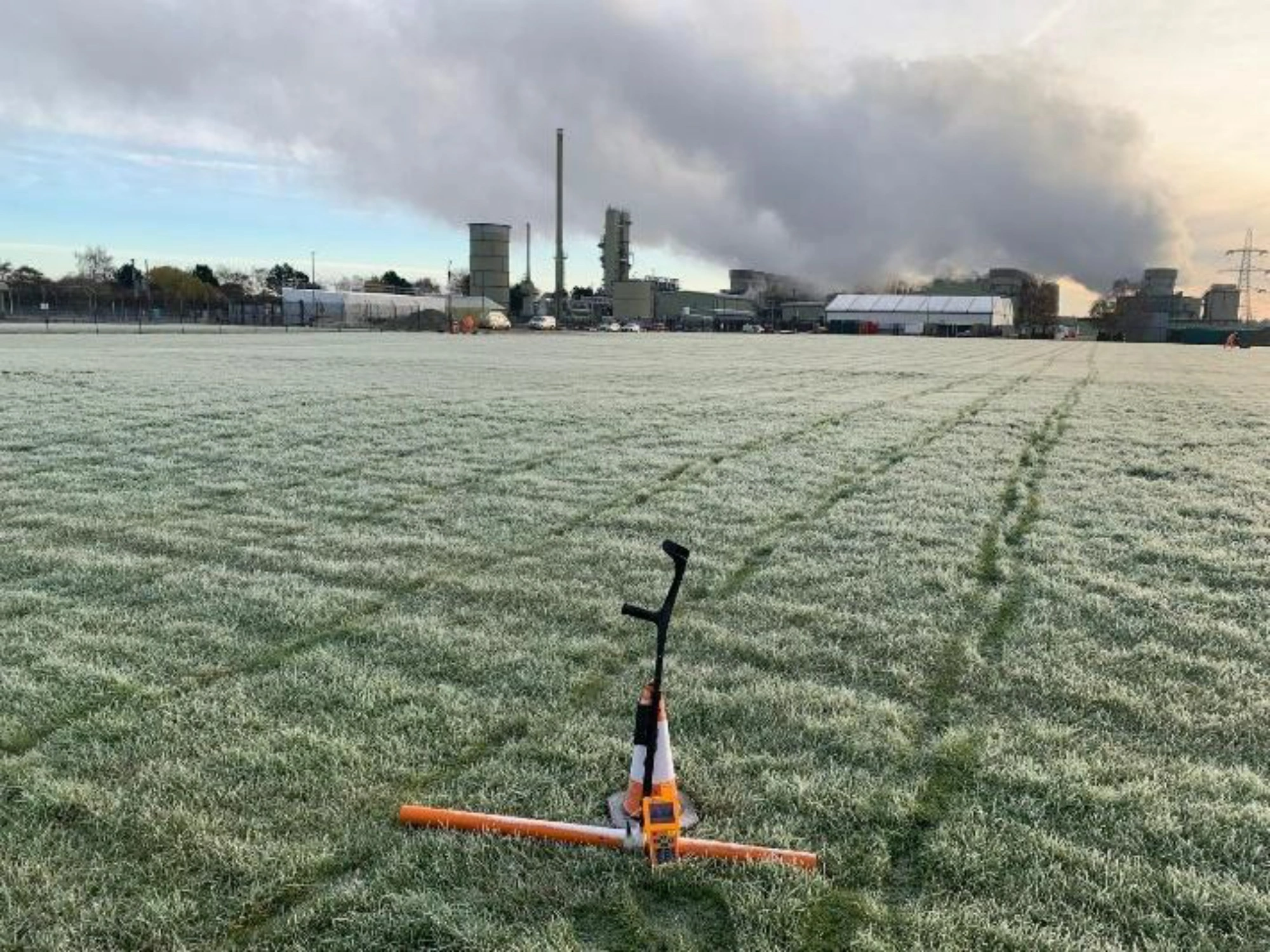 MHLS-uniper-energy-case-study-4 A piece of land surveying equipment on a frosty stretch of grass at Uniper Energy.